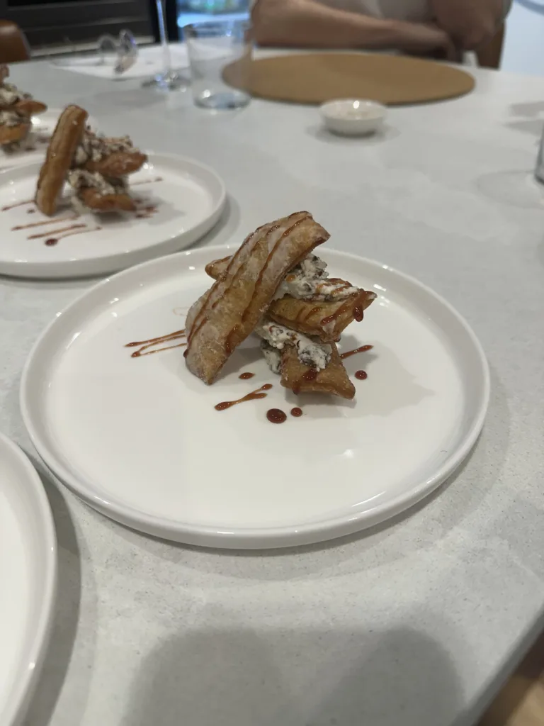 Pastry dessert plated with chocolate at the Monarch Culinary Studio