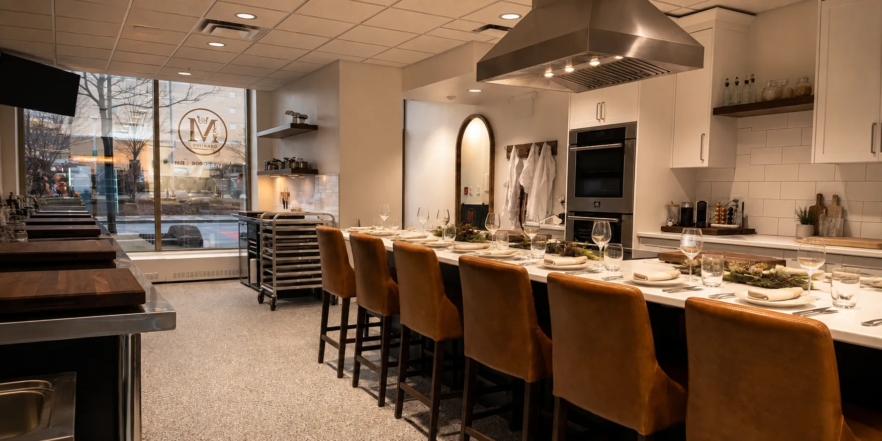 The Monarch Culinary Studio chef's table set for a private dinner