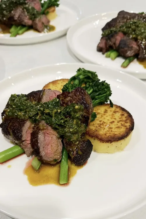 Sliced steak with chimichurri, broccolini and potato rösti